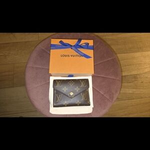 Louis Vuitton Brown Monogram Wallet with Gold Accents